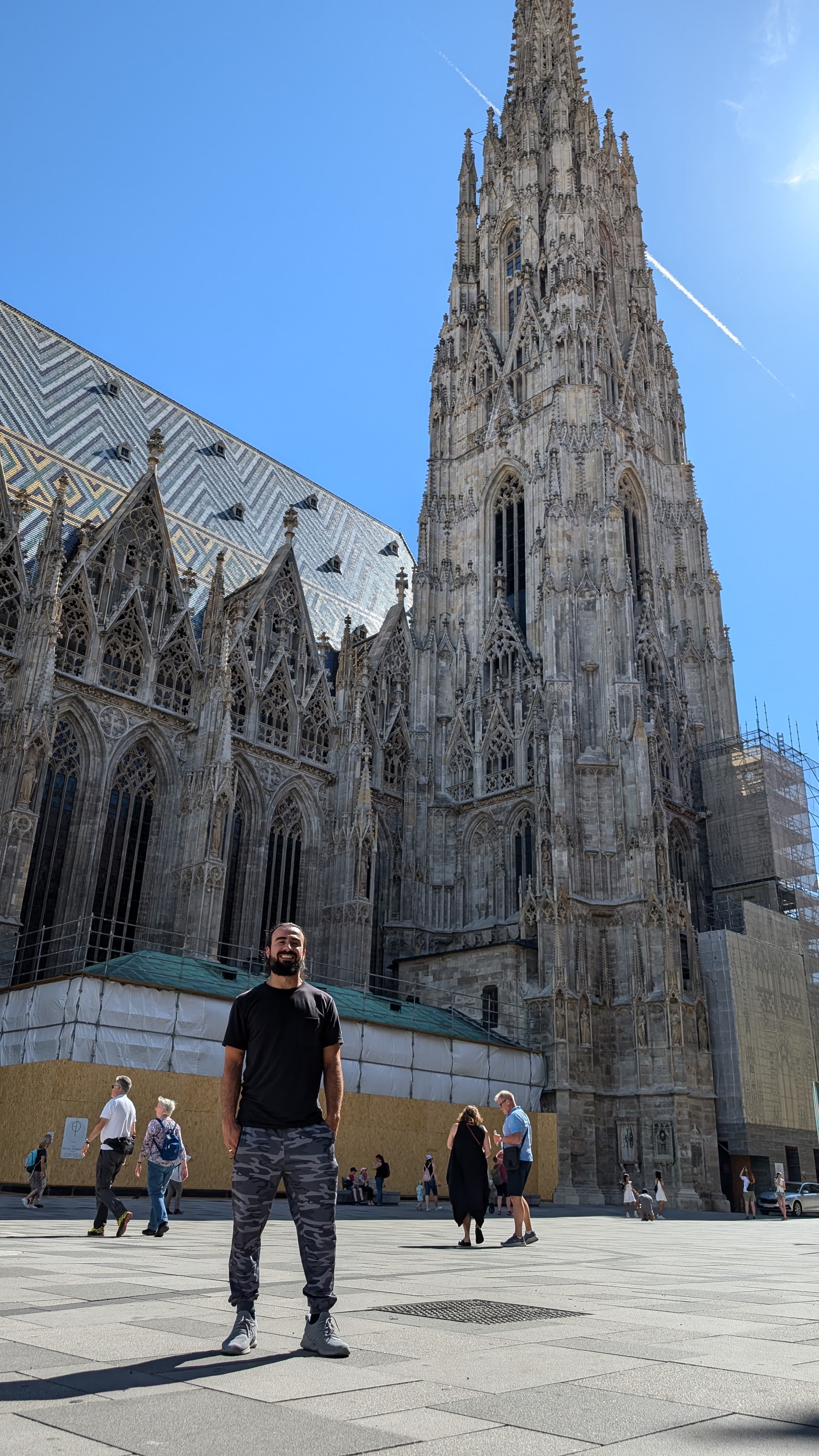 Vienna coffeehouse interior with marble tables, bentwood chairs, and afternoon light