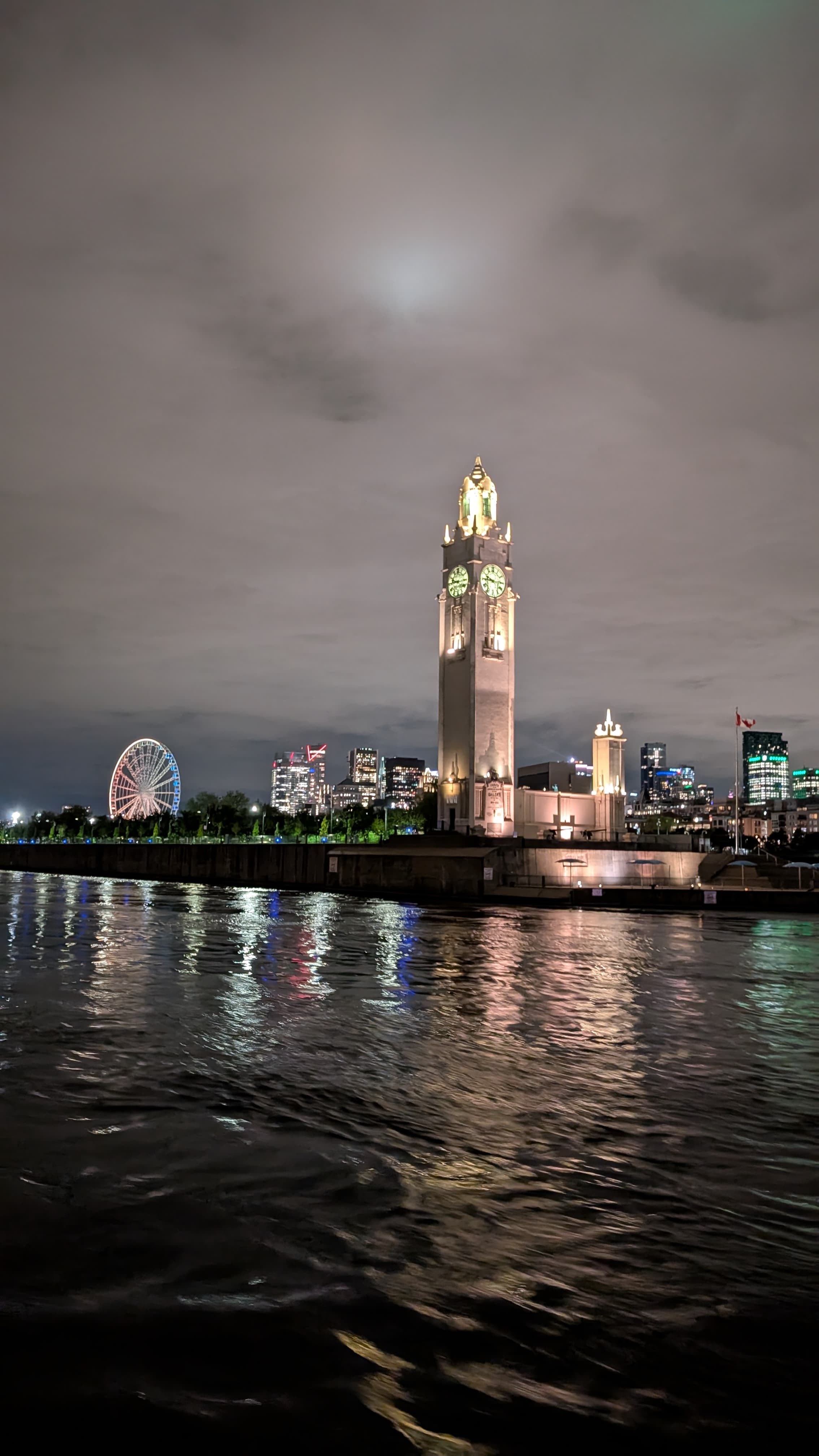 Mont-Royal at dusk. Olmsted designed the park in 1876; the cross at the summit lights up at night.