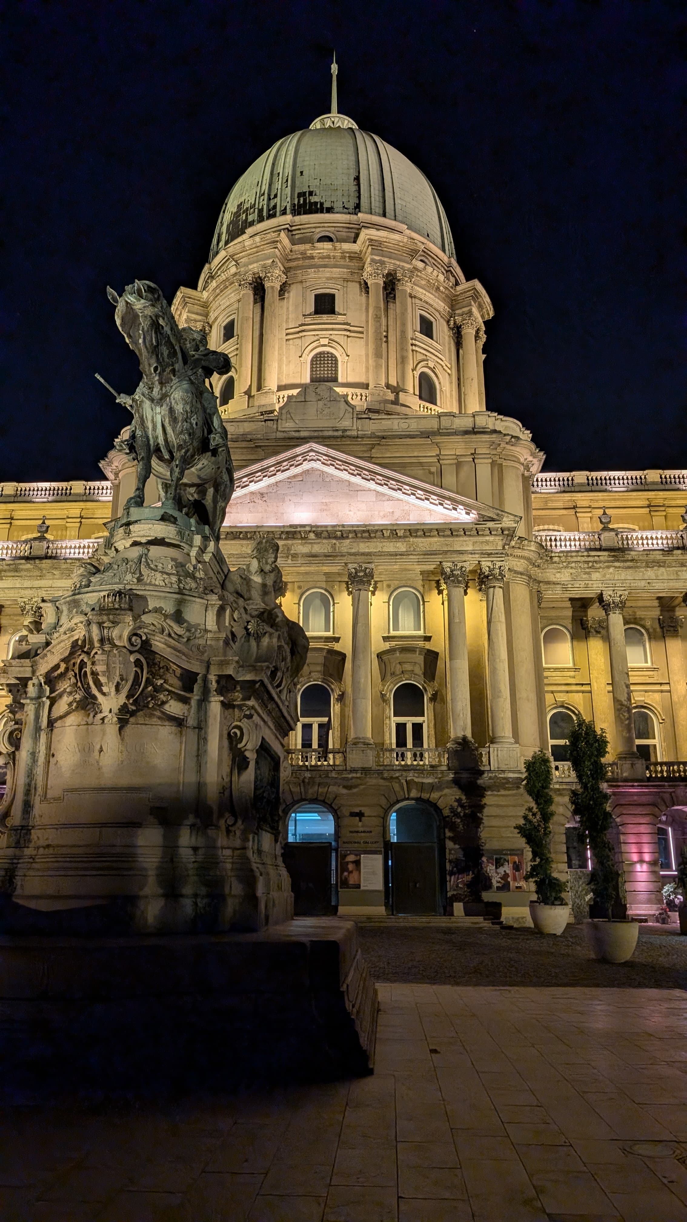 Szimpla Kert ruin bar courtyard. A decade of accumulated objects and plants and strange lighting.