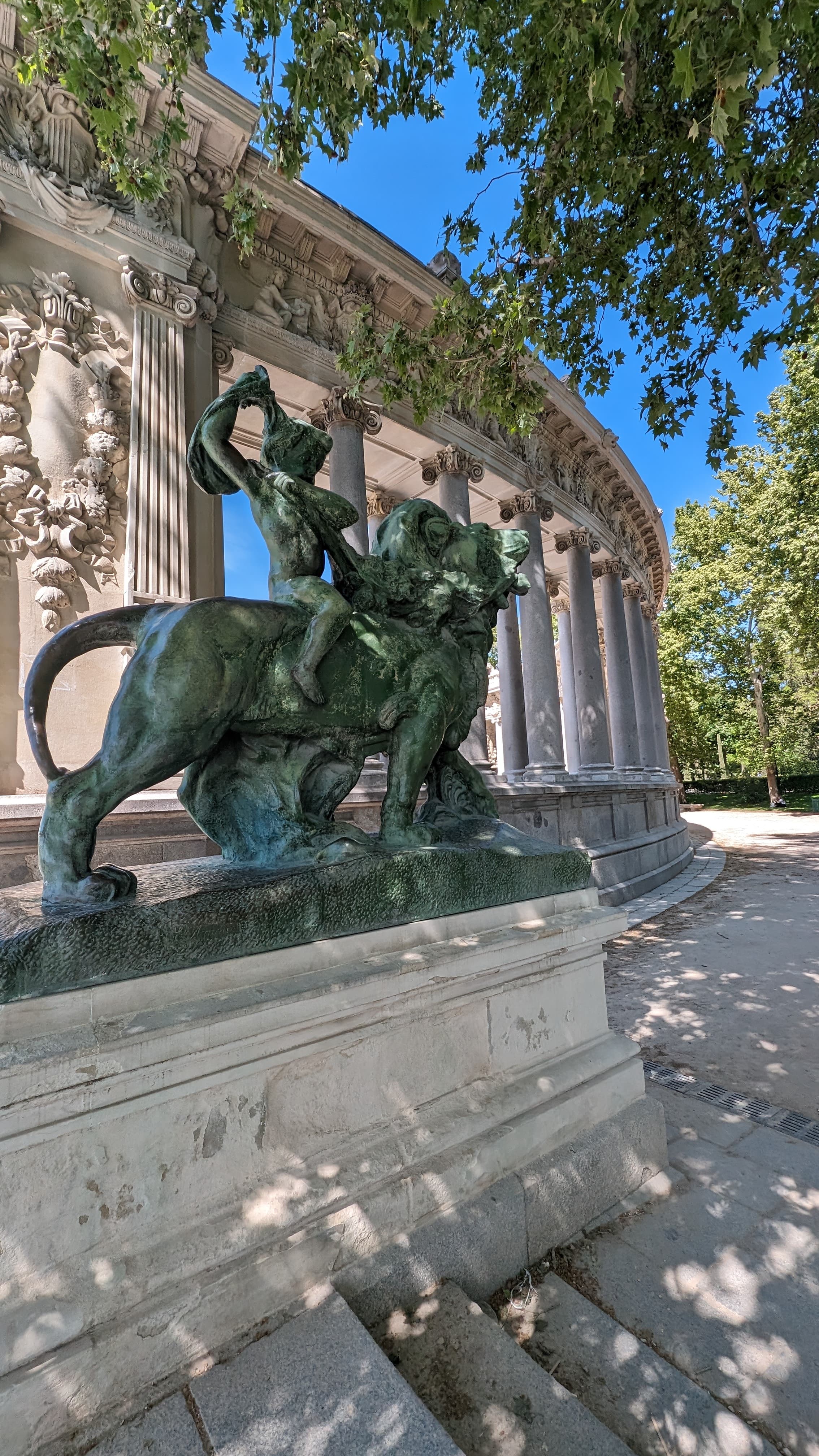 Retiro Park and the Palacio de Cristal. A nineteenth-century iron and glass palace in the middle of a city park.