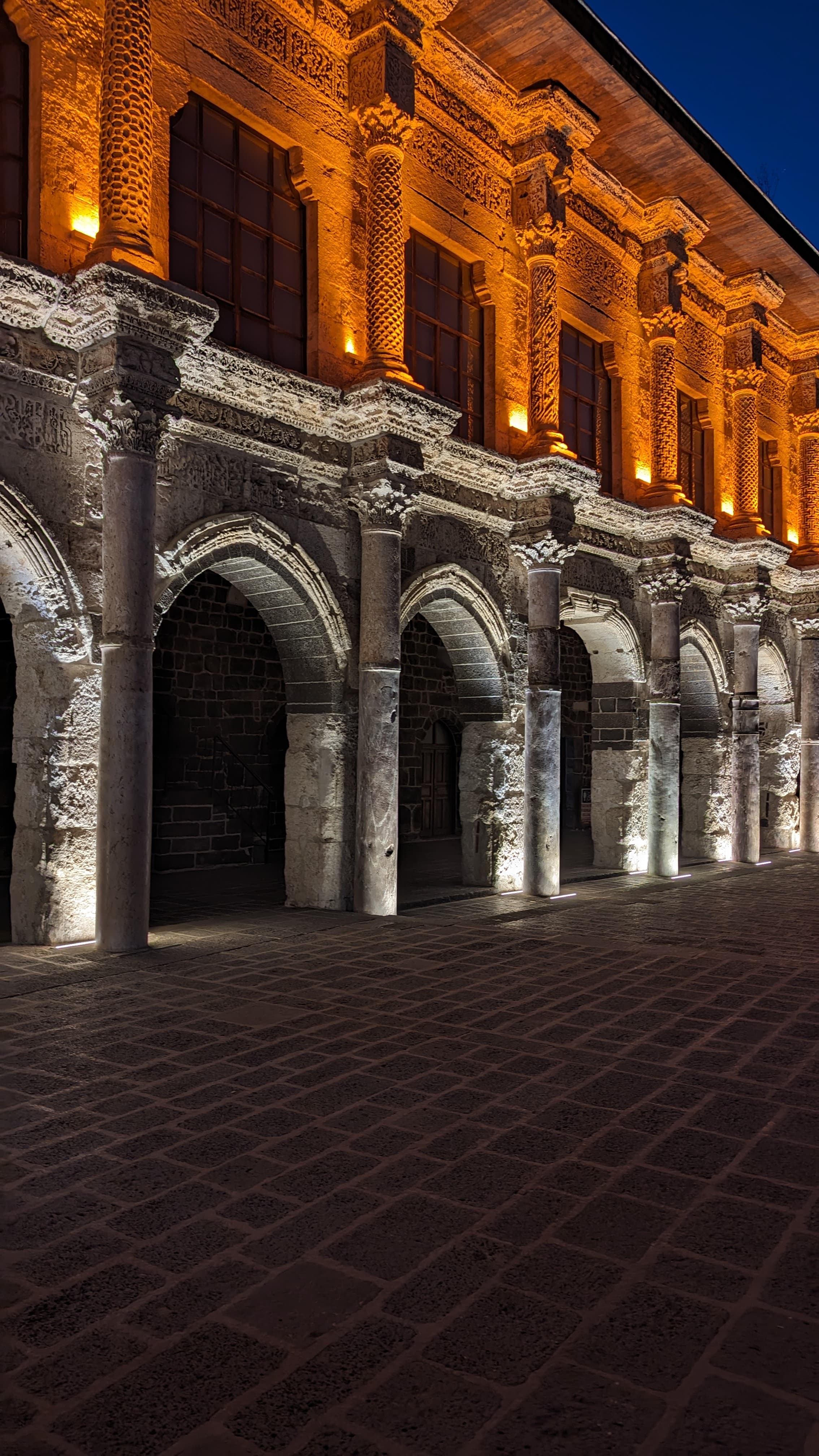 The basalt walls from the Tigris side. Black volcanic stone, six kilometres, 2,000 years old.