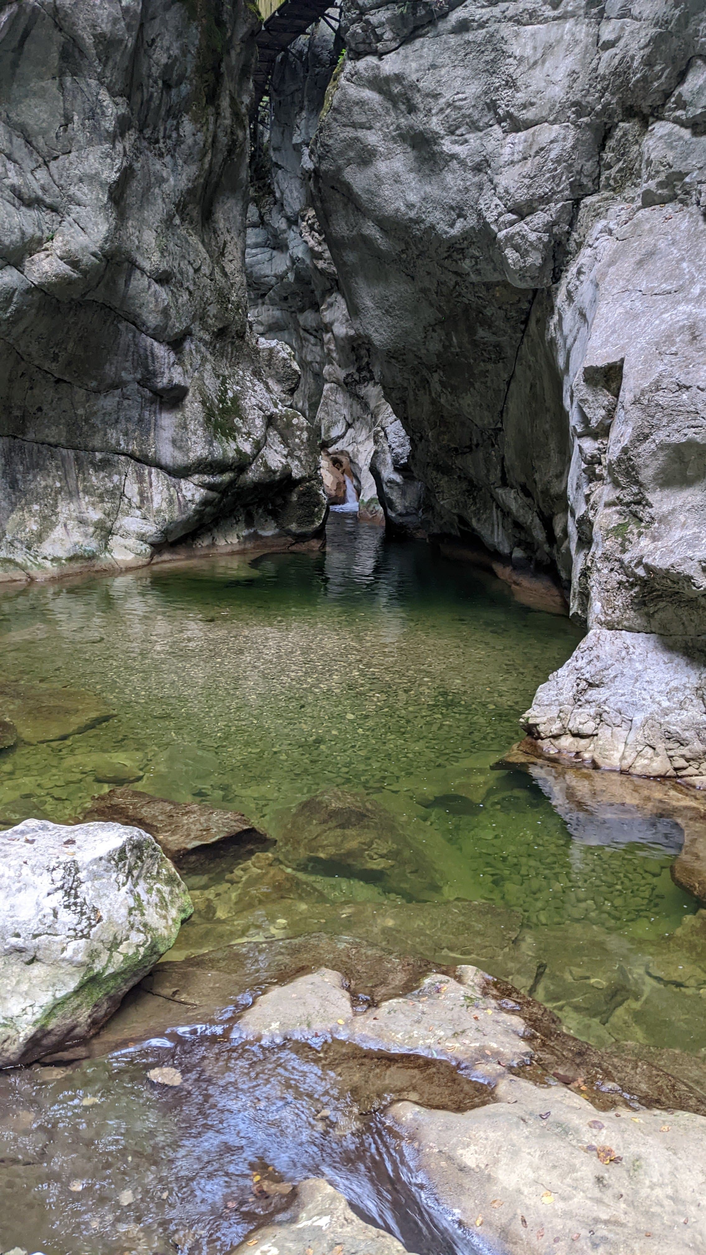 Timber mansions in the old city. Overhanging cumba upper floors, greying joinery, occupied.