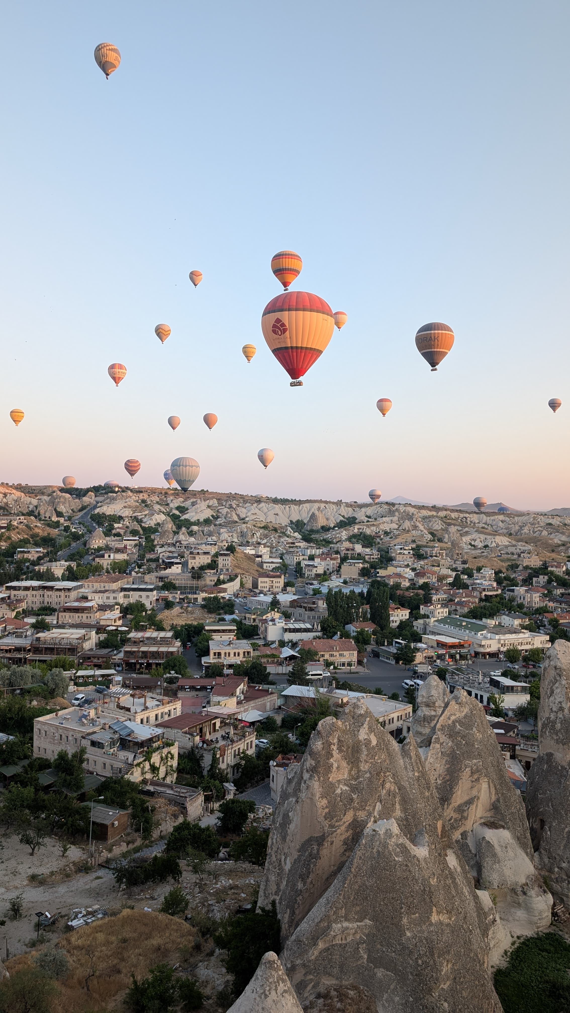 Fairy chimney formations. The tuff ranges from cream to rust depending on mineral content and light.