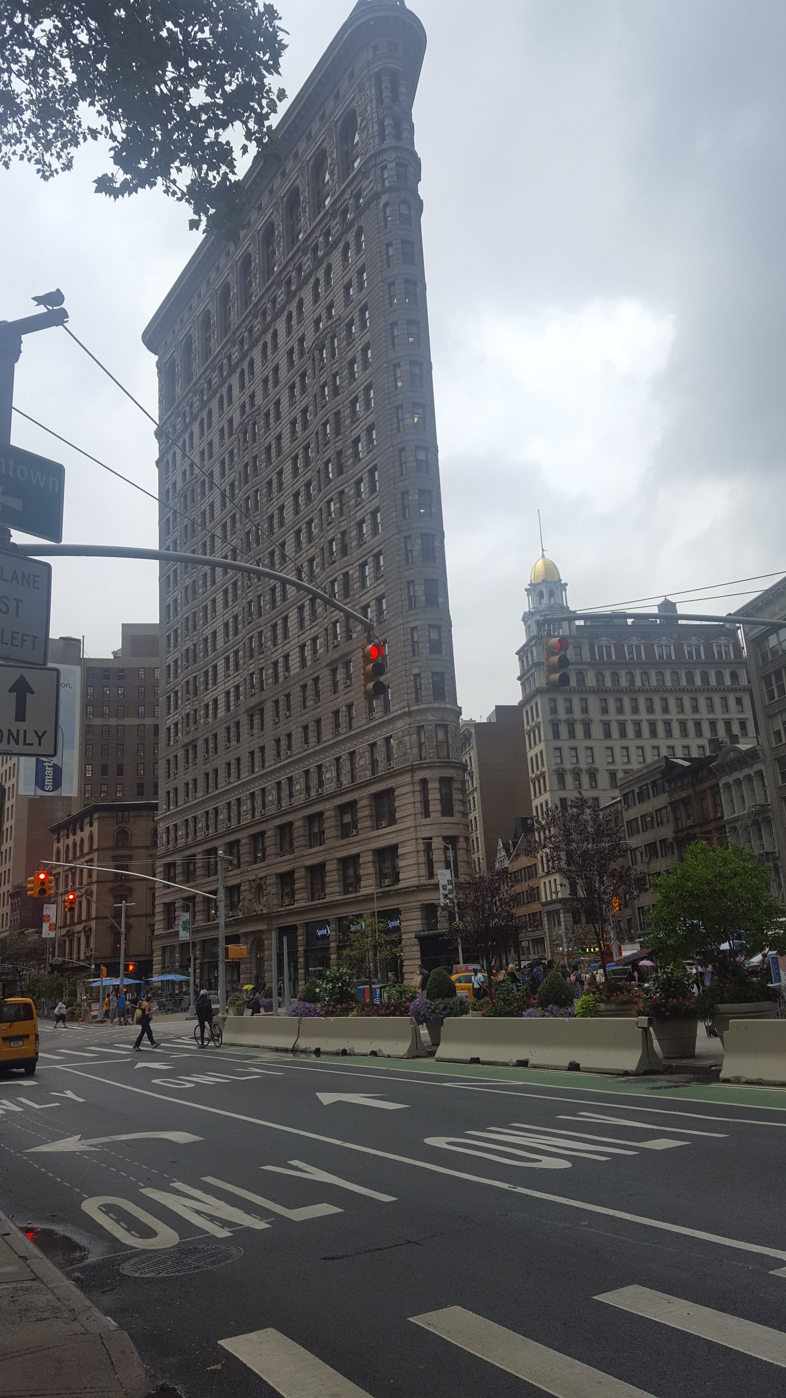 Times Square at night. The saturation of neon and LED is theatrical; it is exactly what it tries to be.