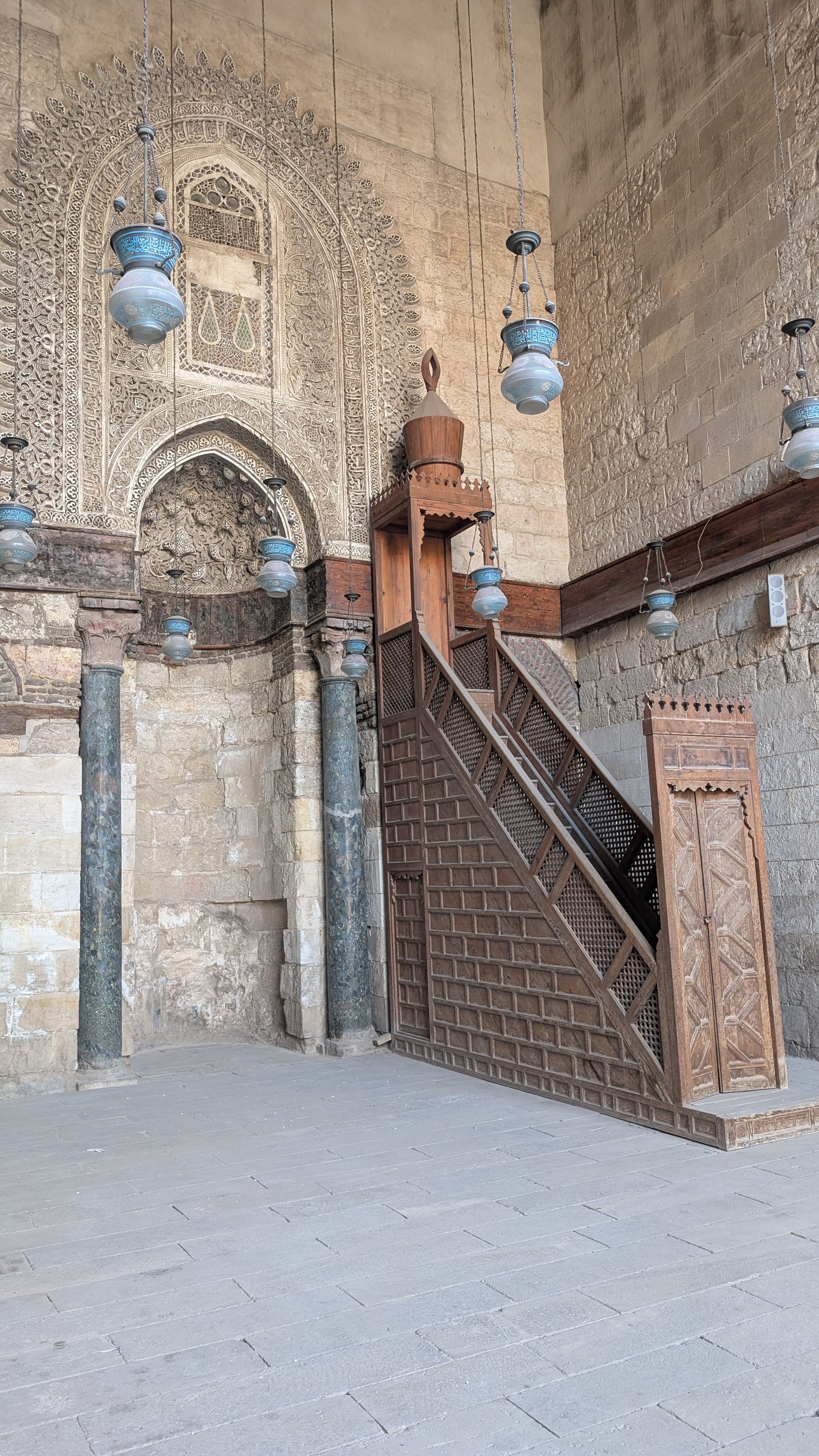 Ornate carved wooden minbar inside Sultan Hassan Mosque, Islamic Cairo