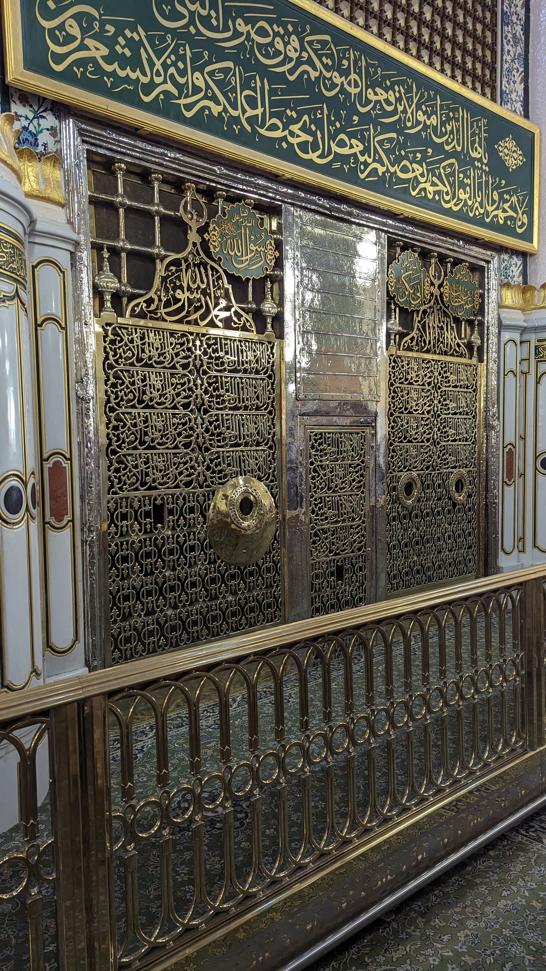 The Prophet's Mosque at night with its famous retractable umbrellas open in the outer courtyard
