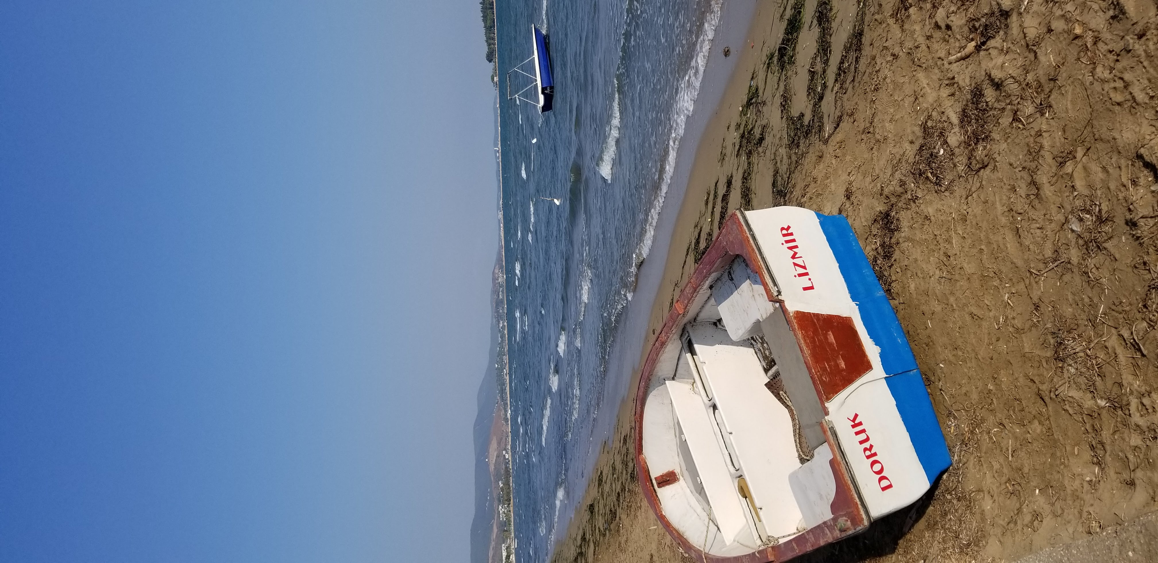 İzmir kordon waterfront at sunset with the Aegean bay stretching to the horizon